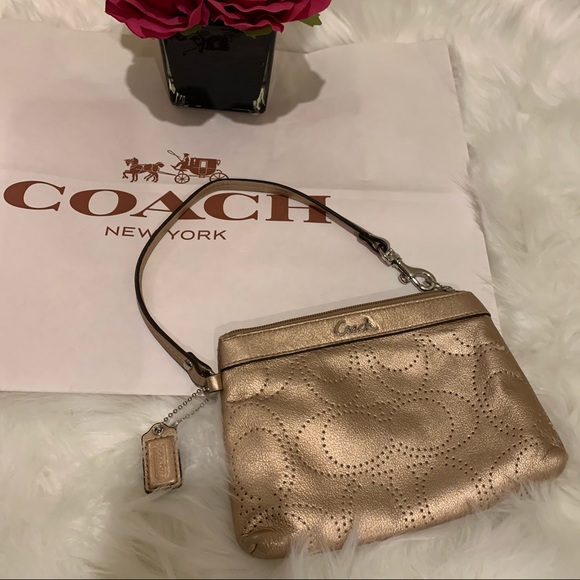 Coach Handbags - COACH Gold Leather Wristlet